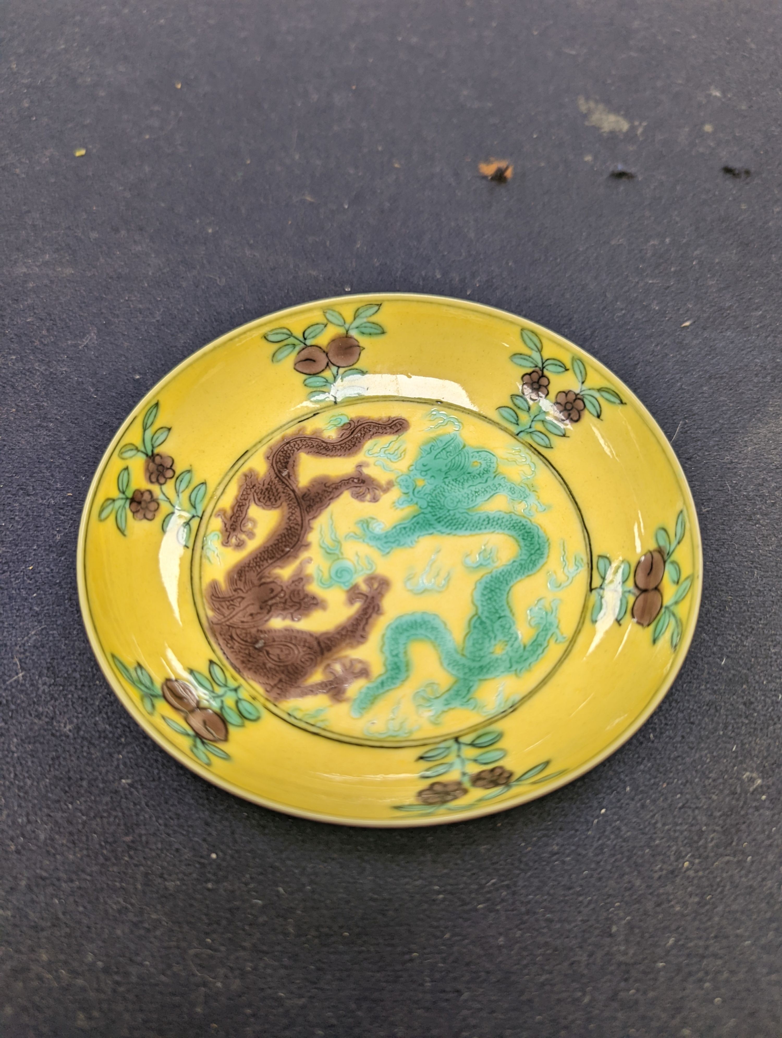 A pair of Chinese yellow, green and aubergine dragon dishes, Guangxu marks, 10cm.